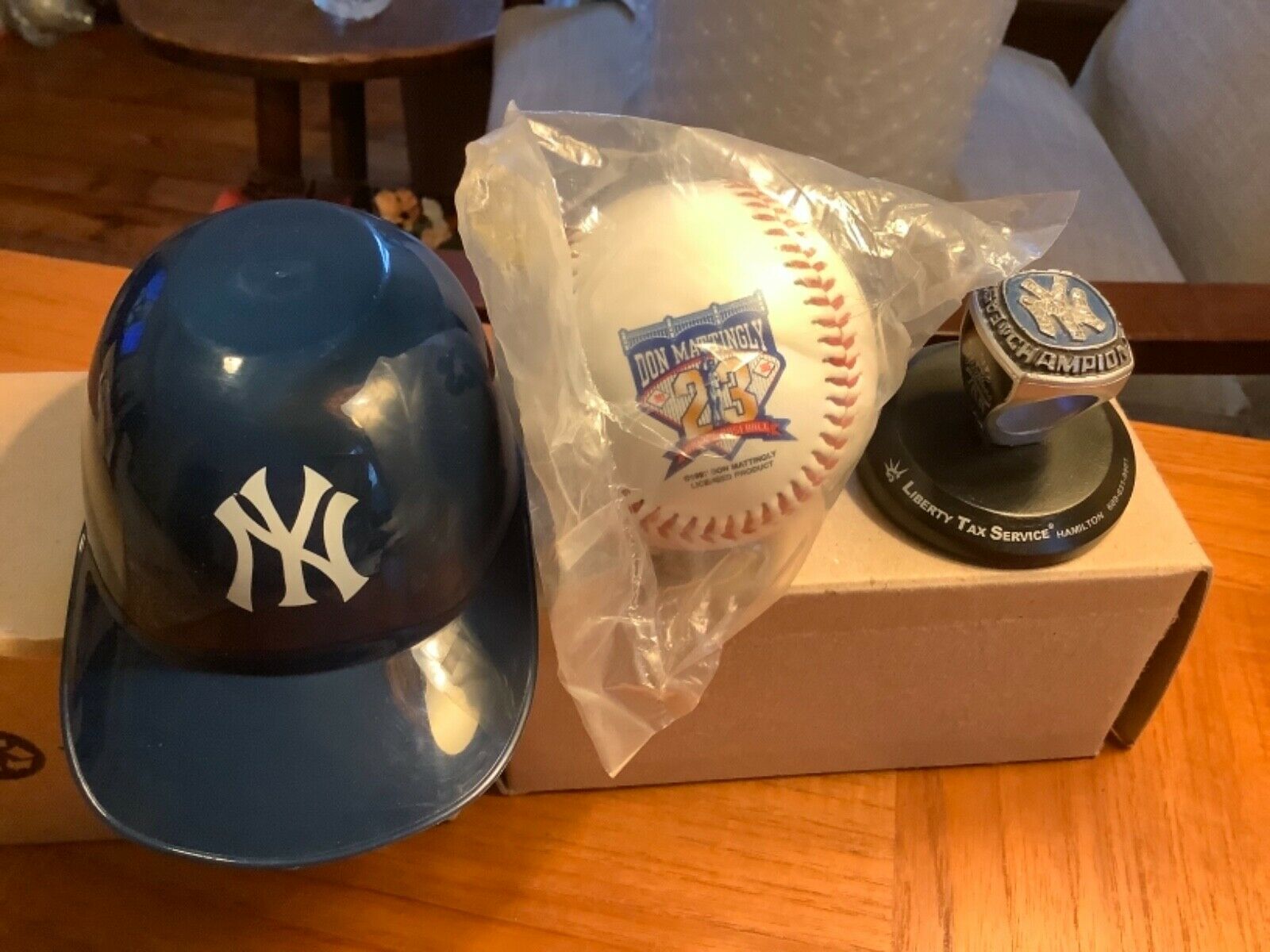 Three New York Yankees Baseball Items: Mini Helmet; Don Mattingly Baseball; Ring